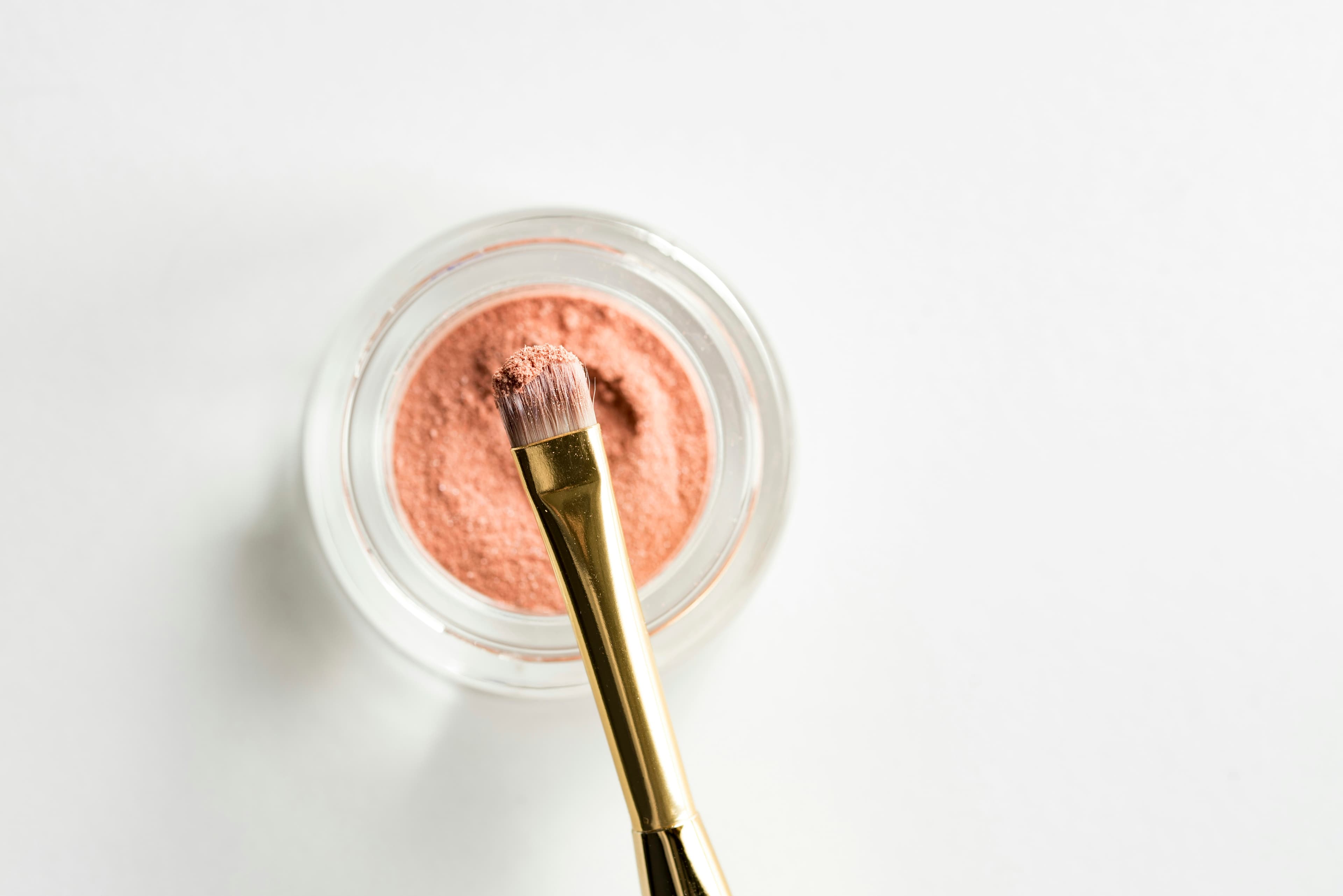 Soft Blur Blush in Soft Petal. Brush resting in soft pink powder blush