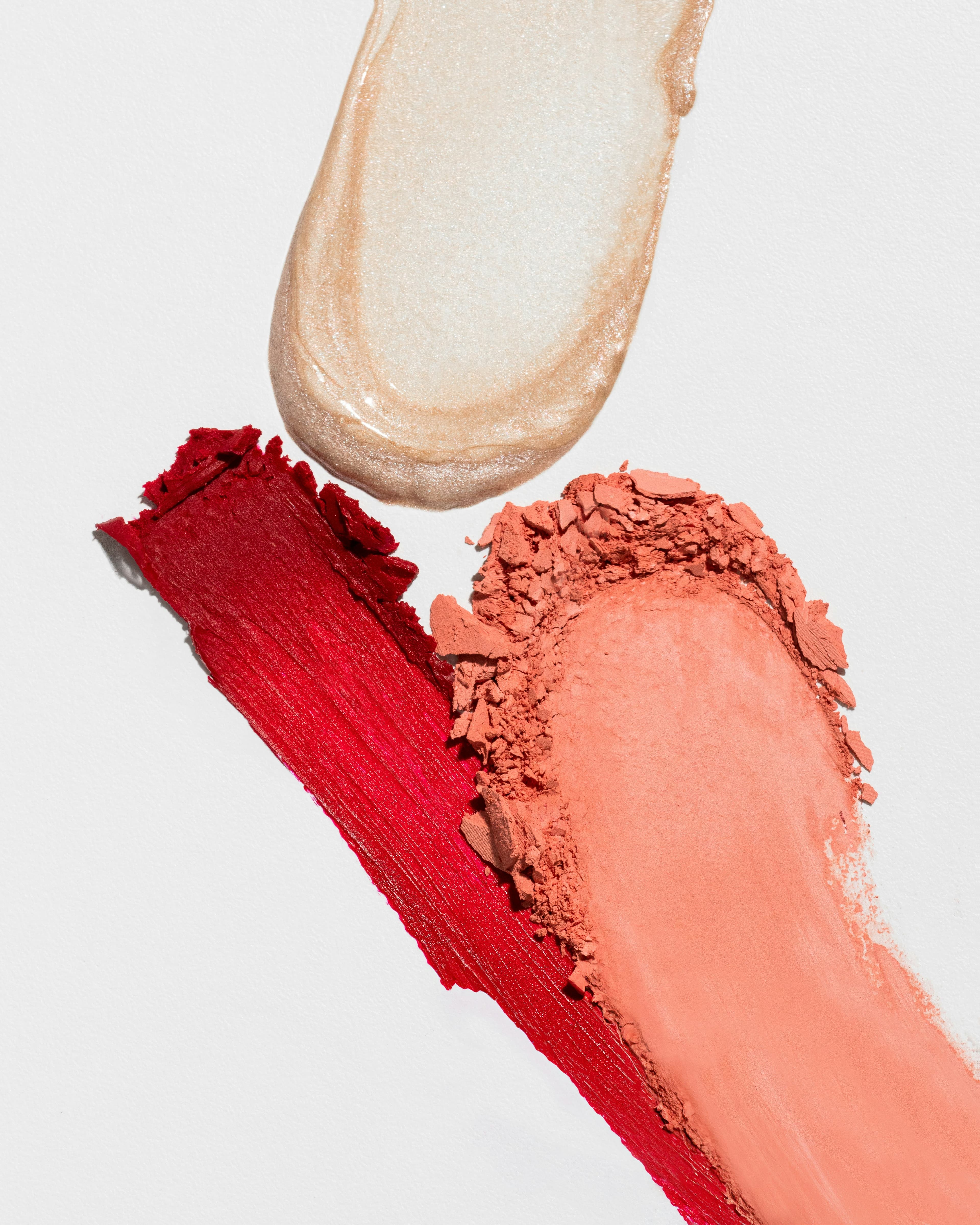 Skin Veil Foundation in Porcelain. Swatches of nude foundation and lip color